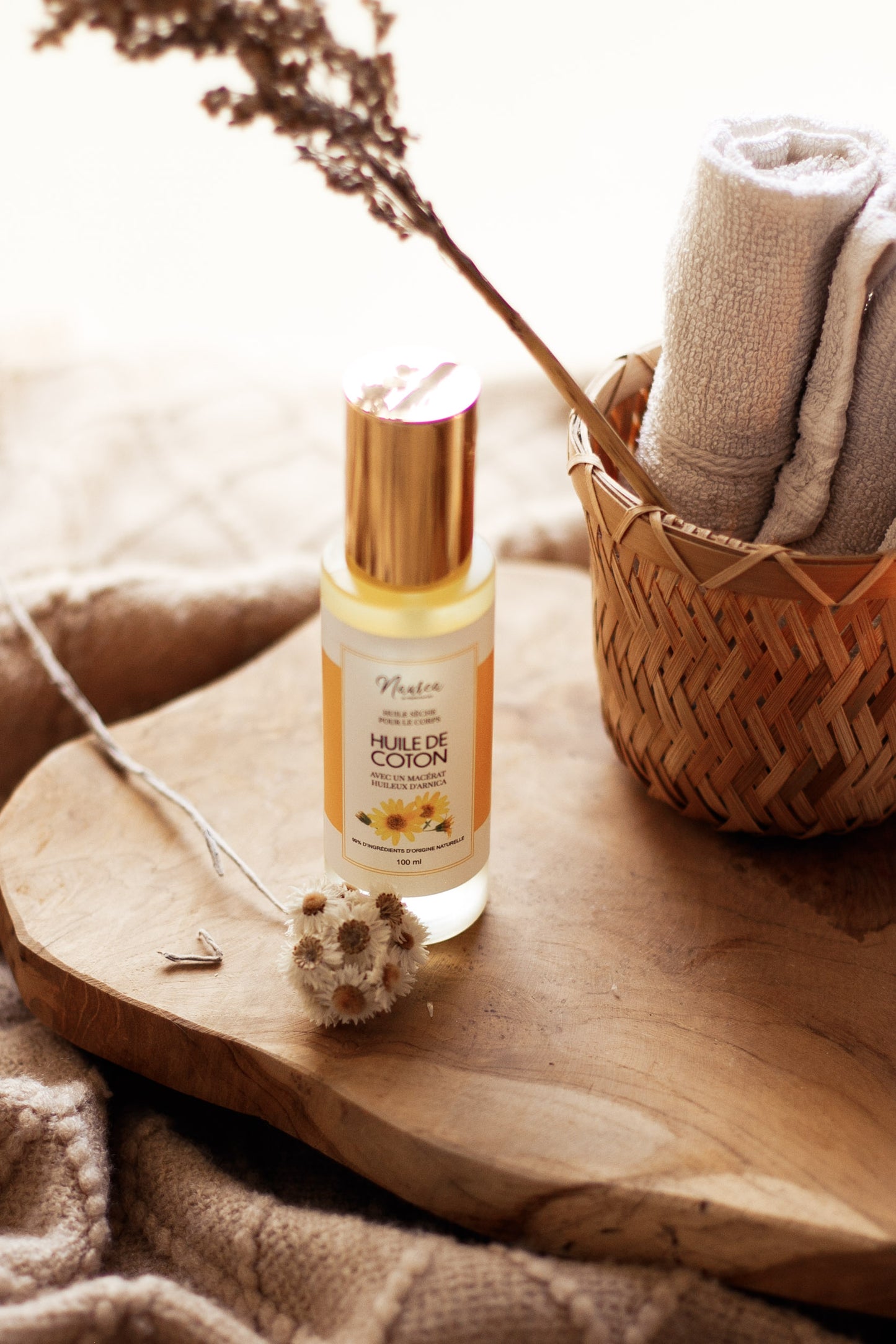 Huile sèche avec un macérât d’Arnica